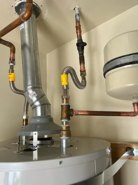 Water heater installation and plumbing repair in Meadowland